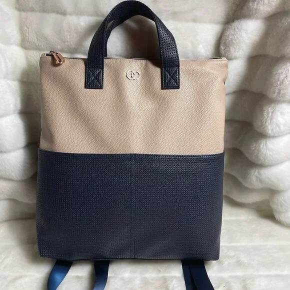 Caboodle Navy blue and beige computer backpack with rose gold hardwares