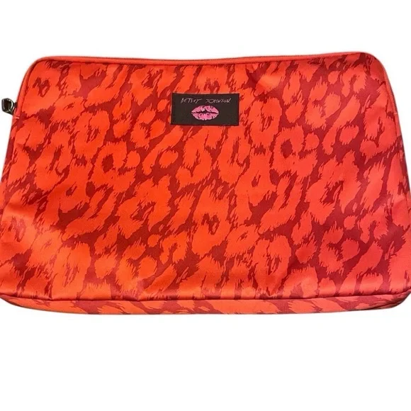 Betsey Johnson red leopard print nylon laptop sleeve.