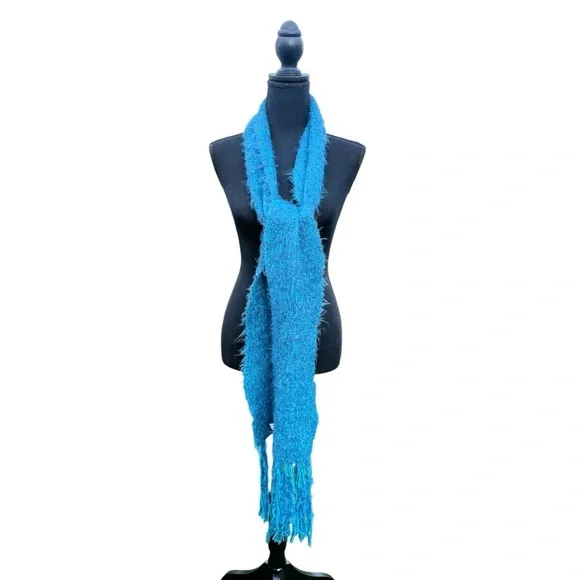 Woman’s turquoise soft scarf