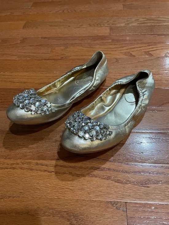 Nine West size 7-1/2 gold ballet flats with embellished rhinestones on toes.
