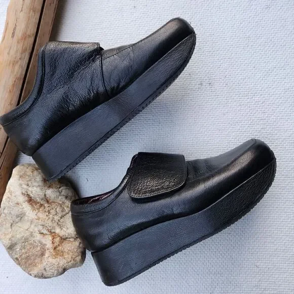 Stephane Kelian black leather loafers