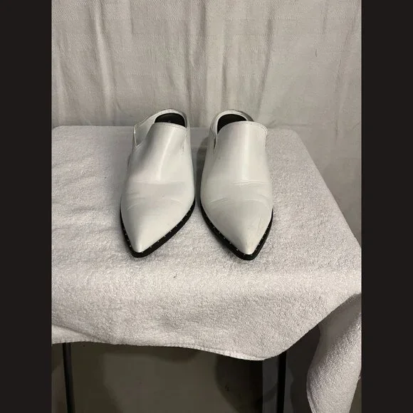 Treasure and Bond Size 9M Miles with heels and silver dot design