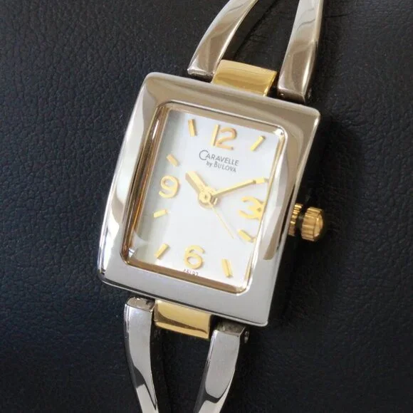 Caravelle Ladies Silver Tone With Gold Accents ½ Bangle Bracelet MOP Dial 16mm