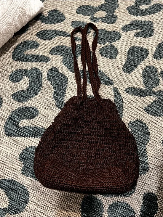 The Sak brown crochet bucket bag