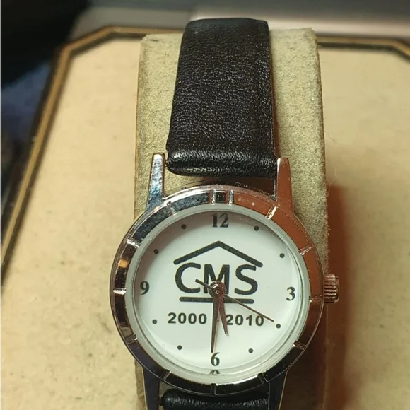 🦋10/$20🦋 CMS 2000-2010 Silver/White Leather Promo Women's Watch