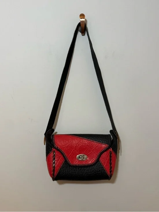 Vintage western leather black and red braided sides fringe shoulder bag purse.