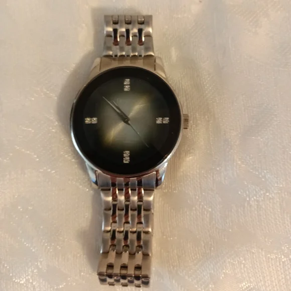 Armitron Unisex watch raised crystal dome face metal silver tone band
