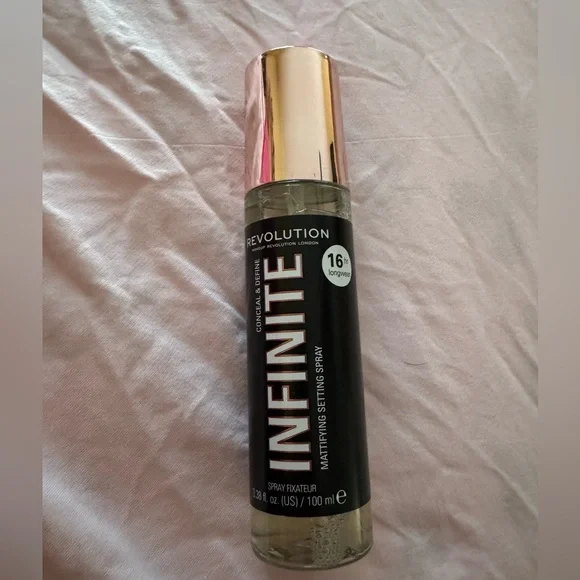New revolution infinite spay fixateur