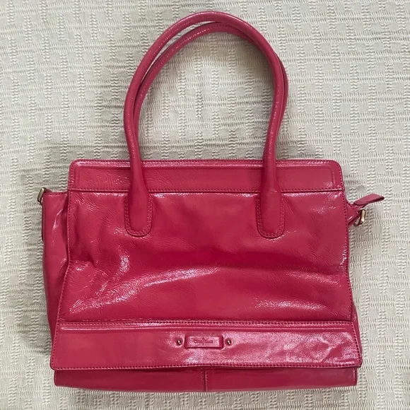 Cole Haan pink patent leather purse.