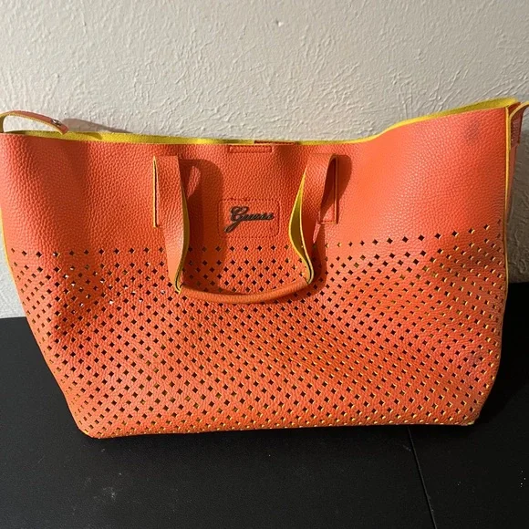 Guess Convertible Hobo Bag in‎ coral and yellow.