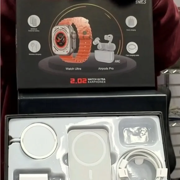 Smart Watch Ultra with gray band earbuds magnetic pad (new never opened) NWT