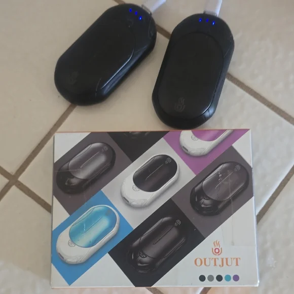 Black Wearable Hand Warmer New in Boxs , dual charging cord inc.