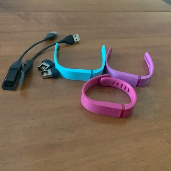 Original Fitbit Flex with 3 bands, 2 chargers and 2 dongles.