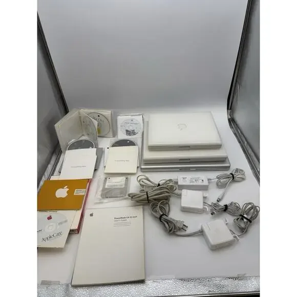 Lot Of 3 Apple iBook’s G3 And Powerbook G4 Laptops With Chargers Manuals Discs.