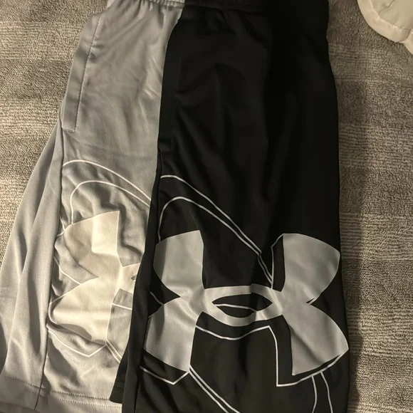 Under Armour basketball shorts 2 pairs 1 black & 1 light gray. Never worn! YM