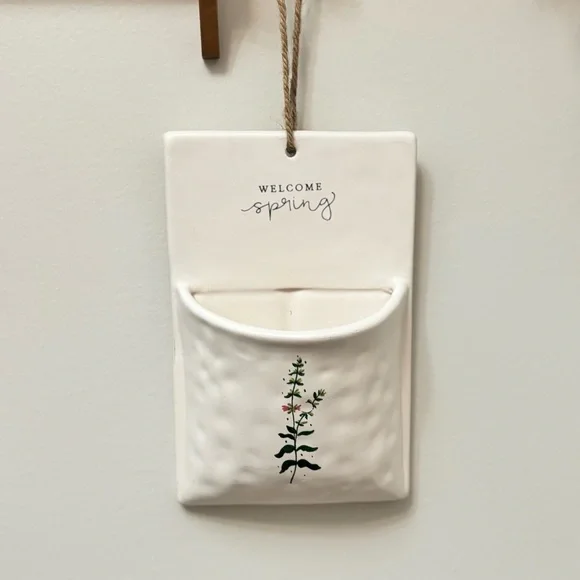 White Ceramic Wall Pocket with Floral Design Welcome Spring