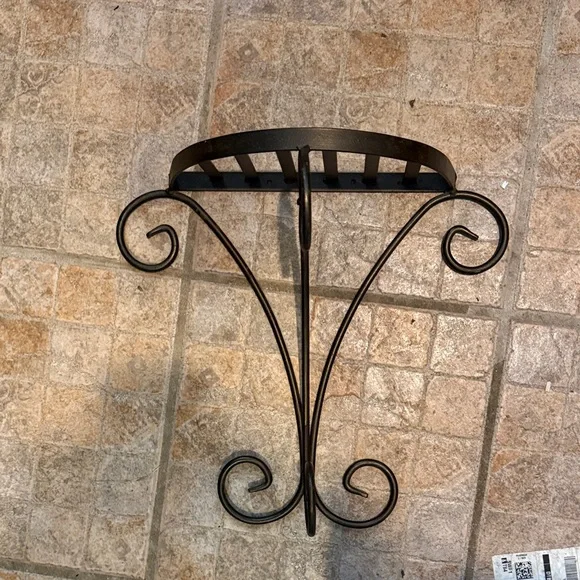 Elegant bronze metal wall shelf