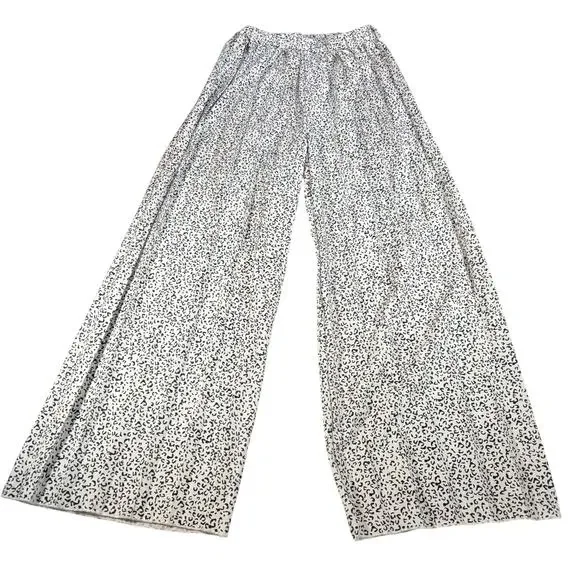 Girls White leopard print wide leg flowy pants. Size 11-12y. animal print, boho