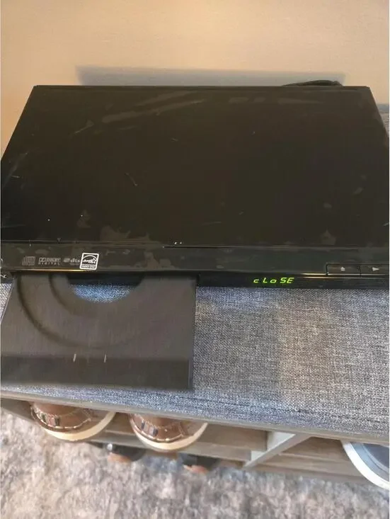 Sony DVP-SR210P Slim Compact DVD Player with Progressive Scan