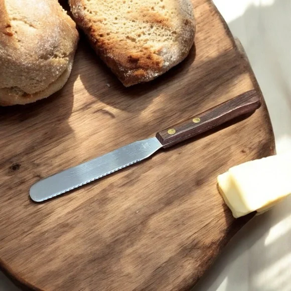 Vintage Parmesan Knife, also known as a snack, cut, and spread knife.