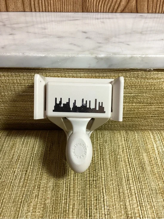 White Wall-Mount Hook with Decorative Skyline Accent