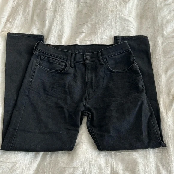 Levi Strauss (Levi’s) charcoal/black, size W34, L30, excellent condition.