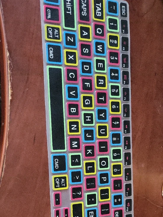 silicone keyboard cover for MacBook Pro and Air features a black layout with lar