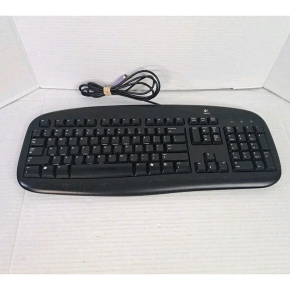 Logitech Wired Deluxe Keyboard Y-SU61 Black PS/2 Purple Connector PN 867462-0403