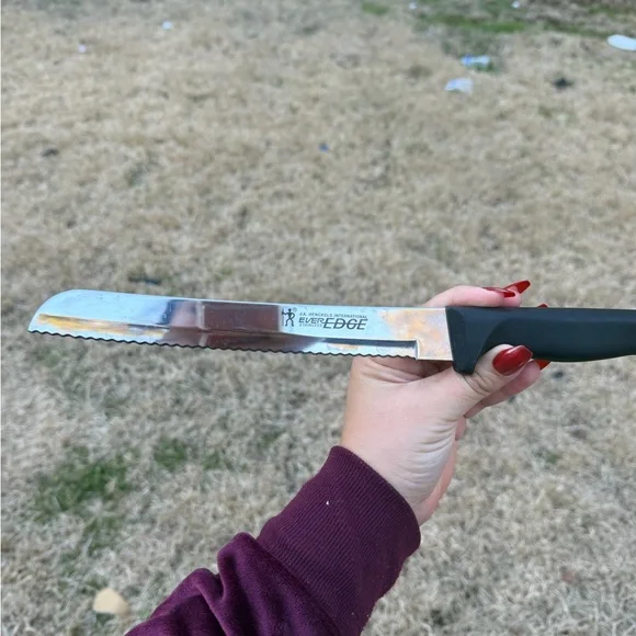ZWILLING J.A. Henckels Serrated Knife with Black Handle