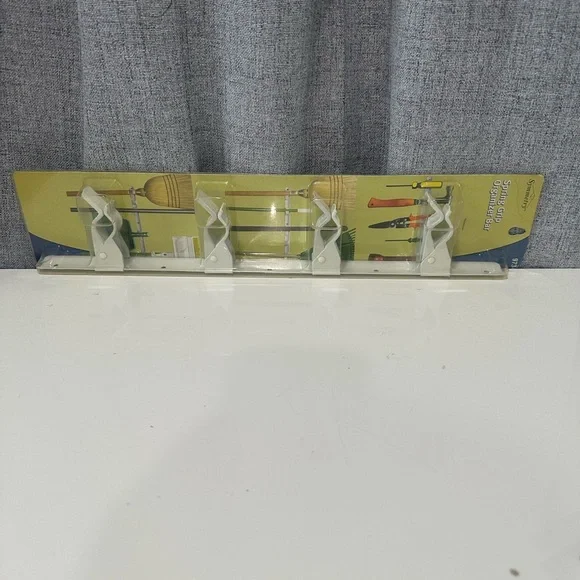 Symmetry spring grip Wall Organizer with White Holders. NWT.