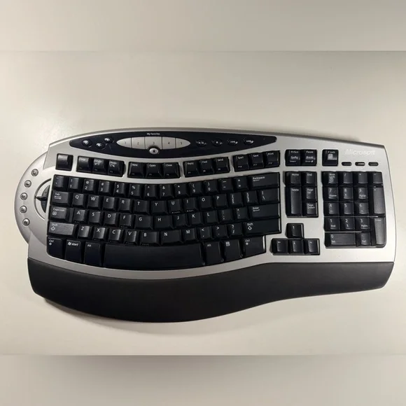Microsoft Wireless Comfort Keyboard 1.0A Ergonomic 1027.w/ Dongle. Tested.