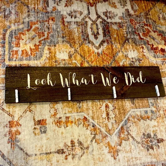 Cute custom “Look What We Did” art display sign.
