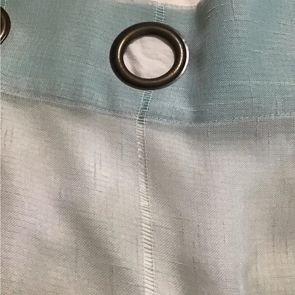 A total of 4 mint green 37 x 96 sheer Curtain panels with Bronze Grommets