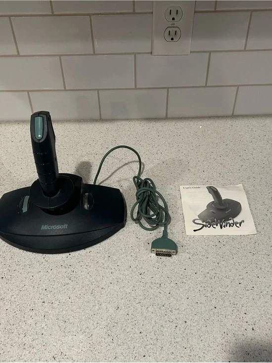 Microsoft SideWinder Joystick in Teal and Black with manual