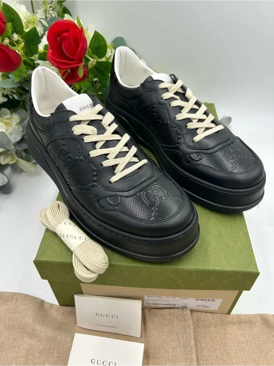 Men's Gucci, GG embossed leather sneakers size 10.5 made in Italy