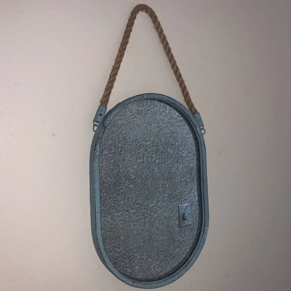 Oval Mirror with Blue metal surrounding and rope to hang