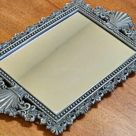 beautiful vintage ornate mirror has hook for hanging