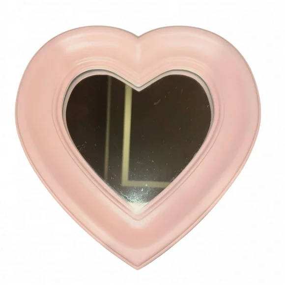 Pink heart shaped mirror. 12x12x2
