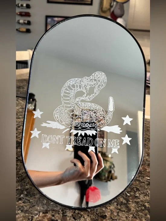 Oval Decorative Mirror with 'Don't Tread On Me' Snake Graphic