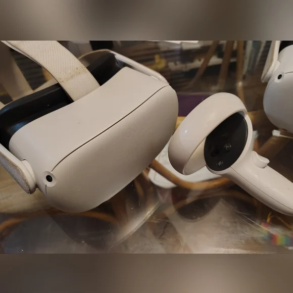 2 VR Headsets and 3 Controllers