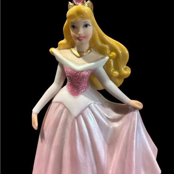Disney Princess Aurora Figurine with Pink Dress and sparkly crown.