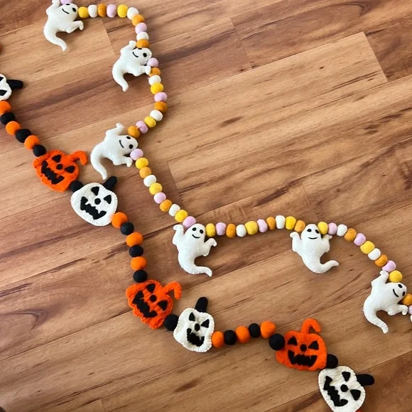 Two Halloween wool buntings, ghost and pumpkin garland