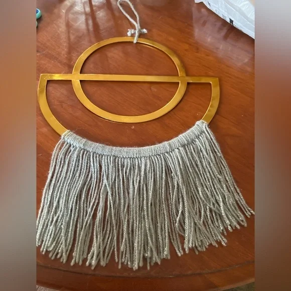 4/$25 Boho Gold finish semi circle metal ring & grey yarn fringe. In EUC.