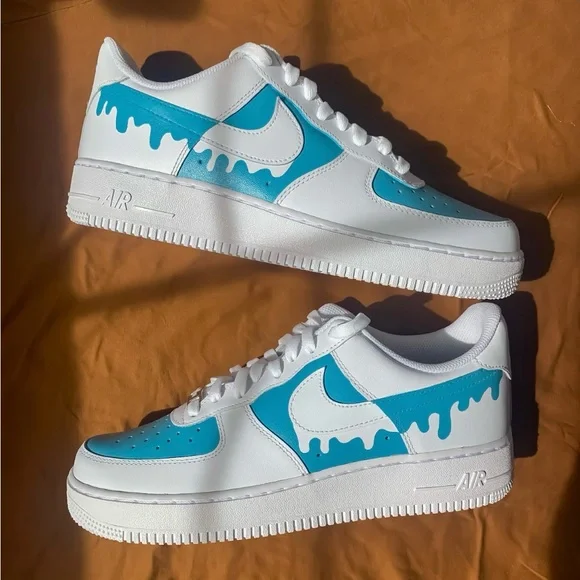 Nike Blue and White Sneakers with Dripping Design