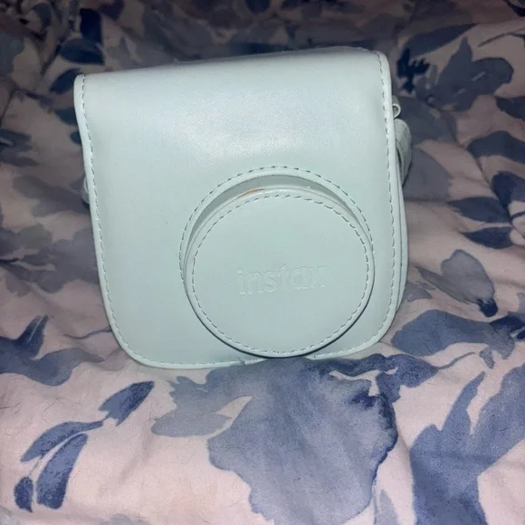 FujiFilm Instant Polaroid Camera, White, Condition; Used.