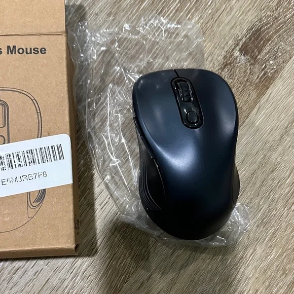 Wireless Black Computer Mouse with blue tint