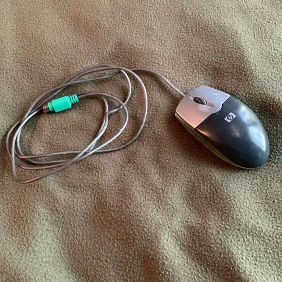 HP computer mouse with cord.