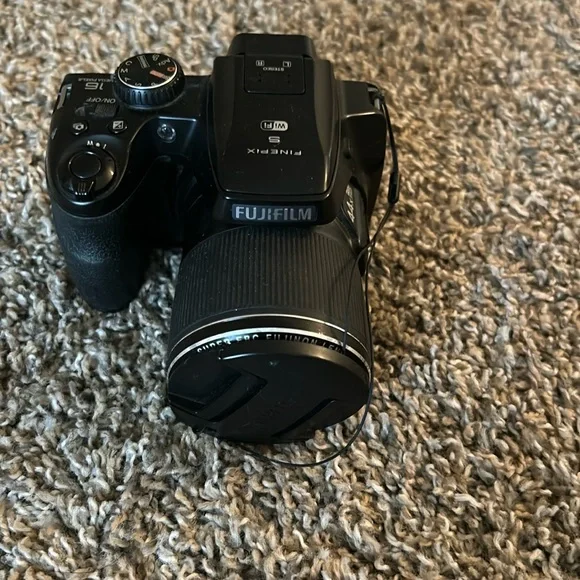 CAMERA Brand:Fuji-film color: Black and it’s digital.