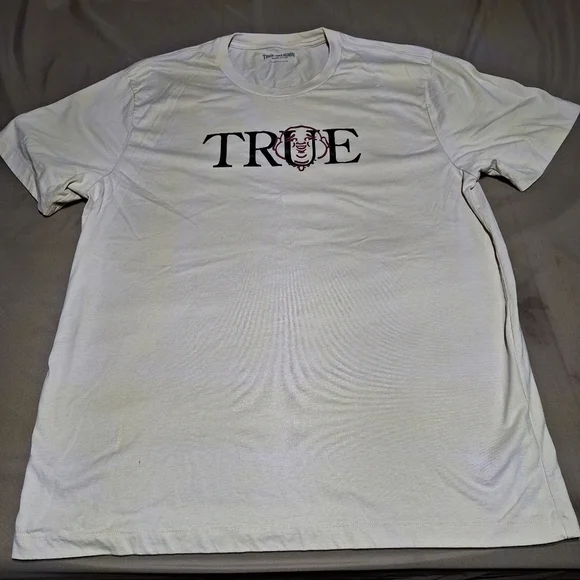 A True Religion T-shirt men's 3XL. Featuring the word True with Buddha