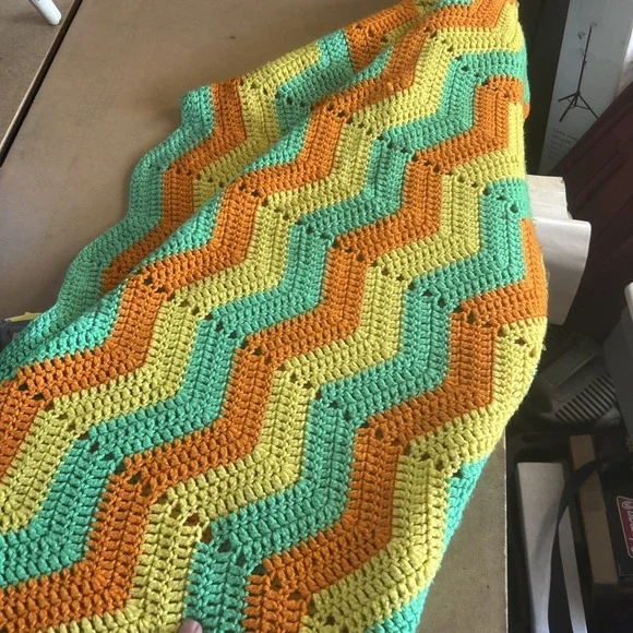 a vintage handmade crochet ripple or chevron pattern blanket 50